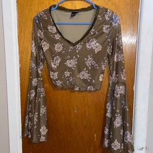 Shein brown top adorned with delicate tan flowers.